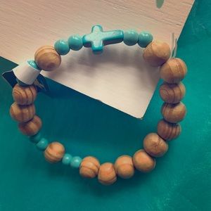 cross and wooden bead bracelet
